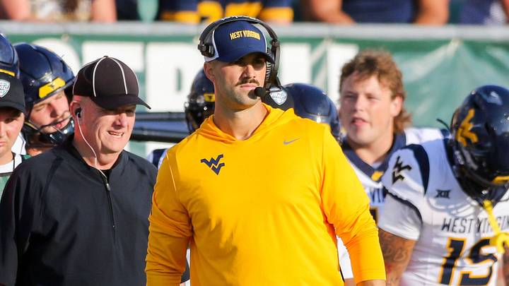 Sep 6, 2025; Athens, Ohio, USA; West Virginia Mountaineers defensive coordinator Zac Alley watches a play during the third quarter against the Ohio Bobcats at Peden Stadium. Mandatory Credit: Ben Queen-Imagn Images Sep 6, 2025; Athens, Ohio, USA; West Virginia Mountaineers defensive coordinator Zac Alley watches a play during the third quarter against the Ohio Bobcats at Peden Stadium. Mandatory Credit: Ben Queen-Imagn Images