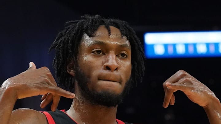 Toronto Raptors guard Immanuel Quickley celebrates after making a three-pointer against the Golden State Warriors.