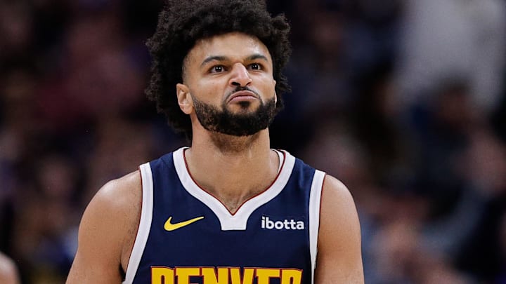 Dec 22, 2025; Denver, Colorado, USA; Denver Nuggets guard Jamal Murray (27) reacts after a play in the first quarter against the Utah Jazz at Ball Arena. Mandatory Credit: Isaiah J. Downing-Imagn Images