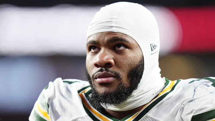 Green Bay Packers defensive end Micah Parsons (1) walks off the field after a torn ACL at Denver.