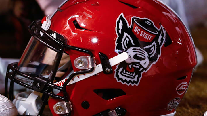 Nov 18, 2017; Winston-Salem, NC, USA; A North Carolina State Wolfpack helmet lays on the sidelines during the game against the Wake Forest Demon Deacons at BB&T Field. Mandatory Credit: Jeremy Brevard-Imagn Images