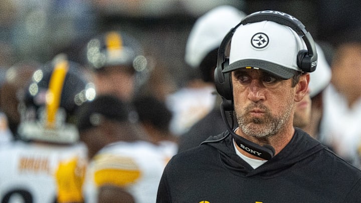 Pittsburgh Steelers quarterback Aaron Rodgers (8) walks along the sideline with a head set during the first half of the first preseason game where the Jacksonville Jaguars hosted the Pittsburgh Steelers Saturday Aug. 9, 2025, at EverBank Stadium in Jacksonville, Fla. [Doug Engle/Florida Times-Union]