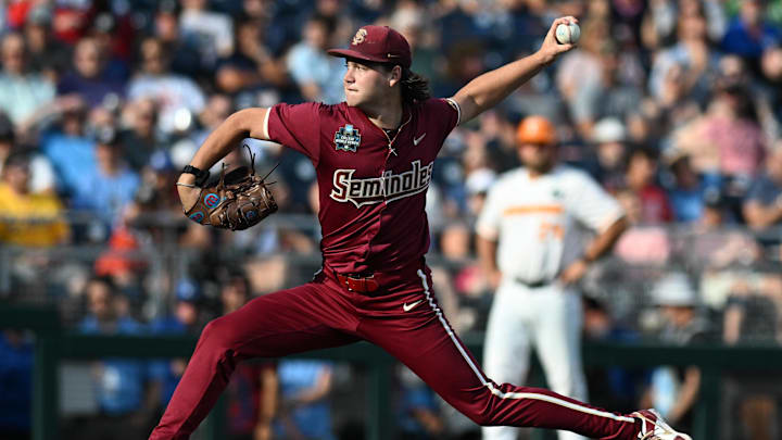 Jun 14, 2024; Omaha, NE, USA;  Florida State Seminoles starting pitcher Jamie Arnold (16) throw against the Tennessee Volunteers during the first inning at Charles Schwab Filed Omaha.