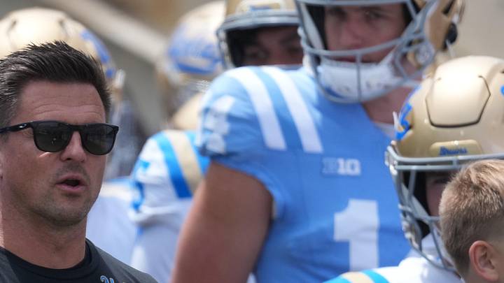 May 2, 2026; Pasadena, CA, USA; UCLA Bruins coach Bob Chesney (left) and son Bob Chesney watch during the spring game at Rose Bowl. Mandatory Credit: Kirby Lee-Imagn Images