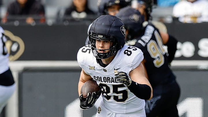 Apr 19, 2025; Boulder, CO, USA; Colorado Buffaloes tight end Zach Atkins (85) and inside linebacker Jeremiah Brown (42) during the spring game at Folsom Field. Mandatory Credit: Isaiah J. Downing-Imagn Images