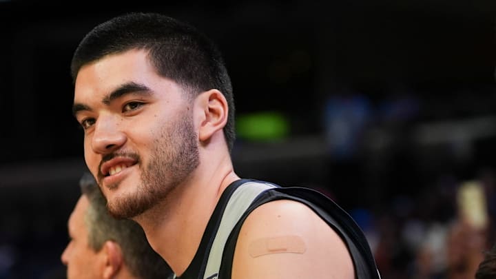 Grizzlies' Zach Edey (14) and Santi Aldama (7) sit on the bench during open practice at the FedExForum on October 4, 2025, in Memphis, Tenn.