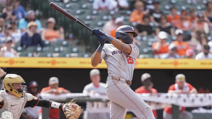 May 18, 2025; Baltimore, Maryland, USA; Washington Nationals left fielder James Wood (29) hits an RBI single against the Baltimore Orioles during the ninth inning at Oriole Park at Camden Yards. May 18, 2025; Baltimore, Maryland, USA; Washington Nationals left fielder James Wood (29) hits an RBI single against the Baltimore Orioles during the ninth inning at Oriole Park at Camden Yards.