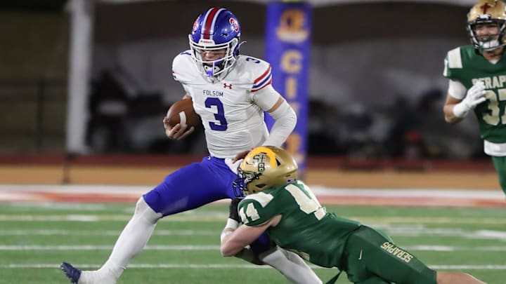 St. Bonaventure's Dylan Dunst tackles Folsom quarterback Ryder Lyons during the fourth quarter of the CIF-State Division 1-A state championship bowl at Saddleback College in Mission Viejo on Saturday, Dec. 9, 2023. St. Bonaventure lost 20-14.
