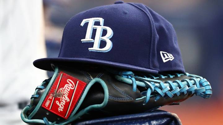 Sep 6, 2019; St. Petersburg, FL, USA; A detail view of a Tampa Bay Rays hat and glove at Tropicana Field. Mandatory Credit: Kim Klement-USA TODAY Sports Sep 6, 2019; St. Petersburg, FL, USA; A detail view of a Tampa Bay Rays hat and glove at Tropicana Field. Mandatory Credit: Kim Klement-USA TODAY Sports