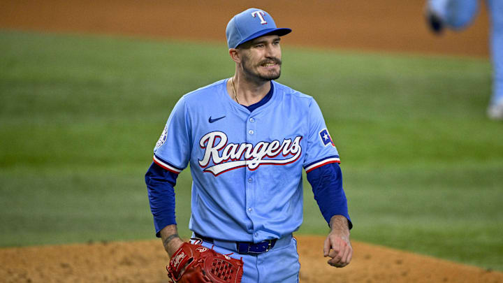 Sep 22, 2024; Arlington, Texas, USA; Texas Rangers starting pitcher Andrew Heaney (44) walks off the field after he pitches against the Seattle Mariners during the fourth inning at Globe Life Field.