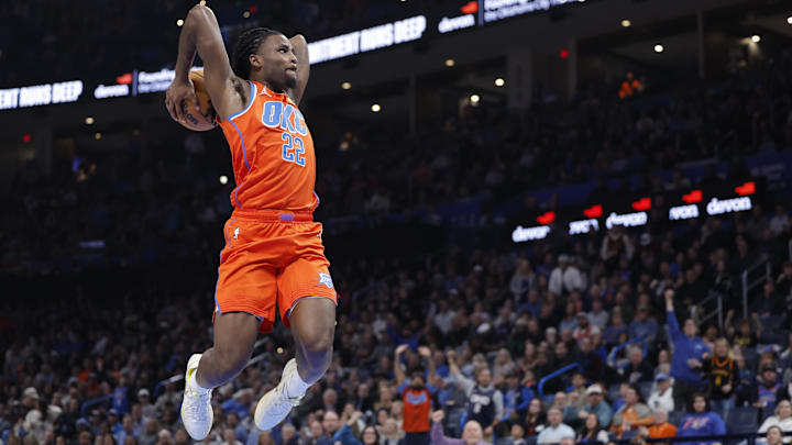 Dec 29, 2025; Oklahoma City, Oklahoma, USA; Oklahoma City Thunder guard Cason Wallace (22) goes up for a dunk against the Atlanta Hawks during the second half at Paycom Center. Mandatory Credit: Alonzo Adams-Imagn Images