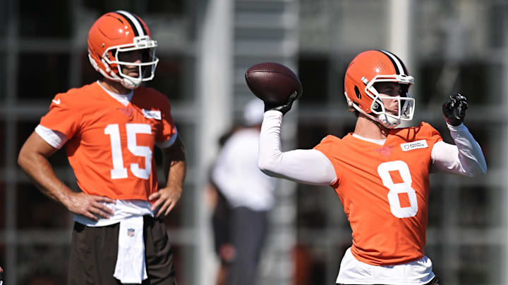 Browns quarterback Kenny Pickett throws a pass as Joe Flacco watches on.