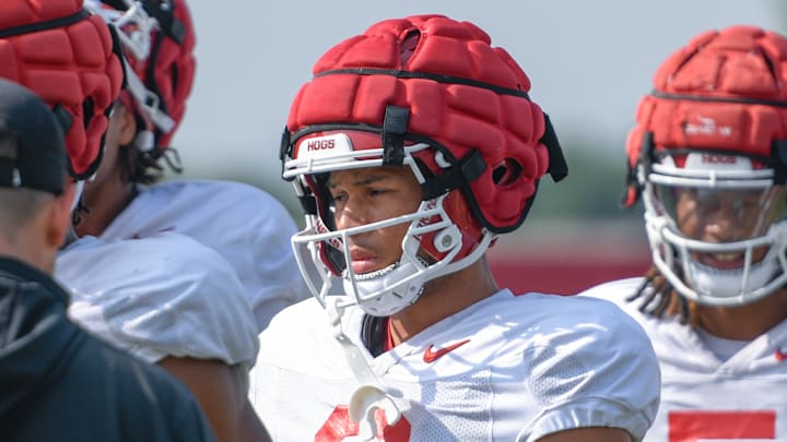 Arkansas Razorbacks wide receiver CJ Brown listens to the coaching staff during preseason practices on the outdoor fields in Fayetteville, Ark.