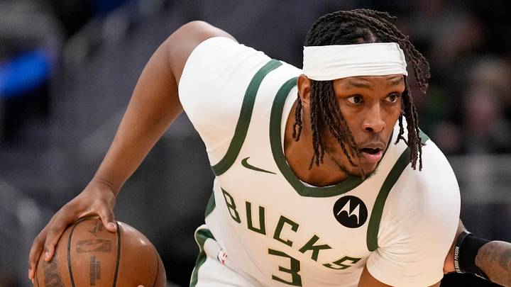 Mar 10, 2026; Milwaukee, Wisconsin, USA; Milwaukee Bucks center Myles Turner (3) holds the ball away from Phoenix Suns forward Royce O’Neal (00) during the first quarter at Fiserv Forum. Mandatory Credit: Jeff Hanisch-Imagn Images Mar 10, 2026; Milwaukee, Wisconsin, USA; Milwaukee Bucks center Myles Turner (3) holds the ball away from Phoenix Suns forward Royce O’Neal (00) during the first quarter at Fiserv Forum. Mandatory Credit: Jeff Hanisch-Imagn Images