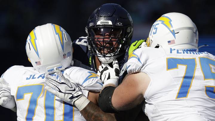 Oct 4, 2026; Seattle, Washington, USA; Seattle Seahawks defensive tackle Leonard Williams (99) rushes against Los Angeles Chargers offensive tackle Rashawn Slater (70) and Los Angeles Chargers guard Trevor Penning (75) during the first half at Lumen Field. Oct 4, 2026; Seattle, Washington, USA; Seattle Seahawks defensive tackle Leonard Williams (99) rushes against Los Angeles Chargers offensive tackle Rashawn Slater (70) and Los Angeles Chargers guard Trevor Penning (75) during the first half at Lumen Field.