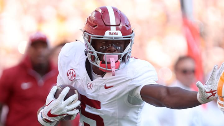 Oct 19, 2024; Knoxville, Tennessee, USA; Alabama Crimson Tide wide receiver Germie Bernard (5) runs the ball against Tennessee Volunteers defensive back Andre Turrentine (2) in the first quarter at Neyland Stadium. Mandatory Credit: Alan Poizner-Imagn Images Oct 19, 2024; Knoxville, Tennessee, USA; Alabama Crimson Tide wide receiver Germie Bernard (5) runs the ball against Tennessee Volunteers defensive back Andre Turrentine (2) in the first quarter at Neyland Stadium. Mandatory Credit: Alan Poizner-Imagn Images