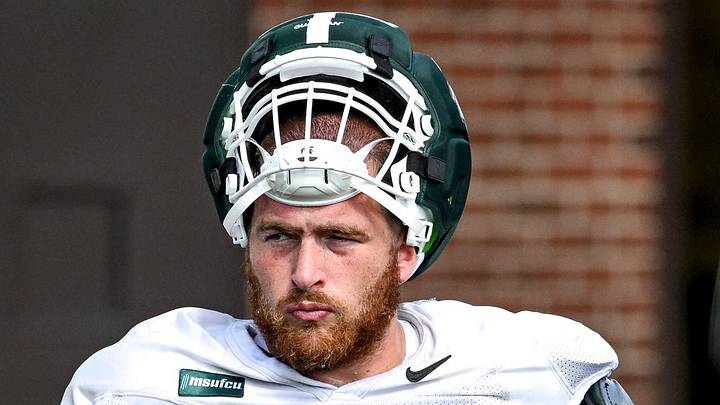 Michigan State’s offensive lineman Ben Murawski looks on during a break in action at football practice on Monday, Aug. 17, 2026, in East Lansing.