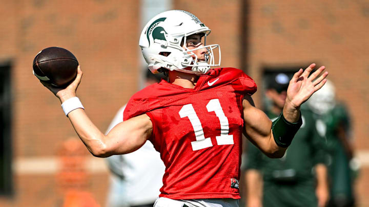 Michigan State's Alessio Milivojevic throws a pass during football practice on Monday, Aug. 11, 2025, in East Lansing. Michigan State's Alessio Milivojevic throws a pass during football practice on Monday, Aug. 11, 2025, in East Lansing.