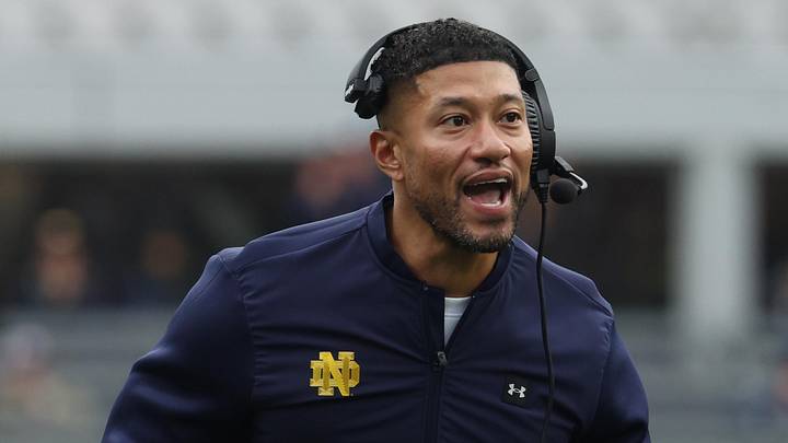 Nov 15, 2025; Pittsburgh, Pennsylvania, USA;  Notre Dame Fighting Irish head coach Marcus Freeman reacts after an Irish touchdown against the Pittsburgh Panthers during the second quarter at Acrisure Stadium. 