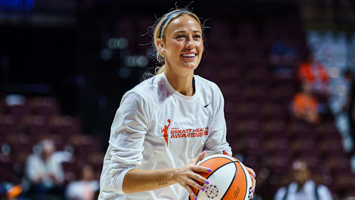 Aug 17, 2025; Uncasville, Connecticut, USA; Indiana Fever guard Sophie Cunningham (8) warms up before the start of the game against the Connecticut Sun at Mohegan Sun Arena. Mandatory Credit: David Butler II-Imagn Images