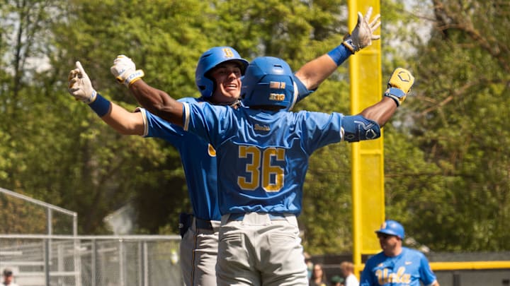 UCLA’s Dean West, left, celebrates his first inning home run with teammate Roman Martin at PK Park in Eugene. UCLA’s Dean West, left, celebrates his first inning home run with teammate Roman Martin at PK Park in Eugene.