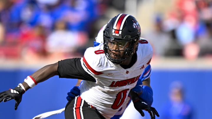 Nov 22, 2025; Dallas, Texas, USA;  Louisville Cardinals wide receiver Chris Bell (0) runs a route during the game between the Mustangs and the Cardinals at Gerald J. Ford Stadium. Mandatory Credit: Jerome Miron-Imagn Images
