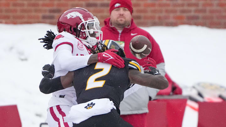 Missouri Tigers cornerback Toriano Pride Jr. (2) breaks up a pass intended for Arkansas Razorbacks wide receiver Andrew Armstrong (2) during the first half at Faurot Field at Memorial Stadium. 