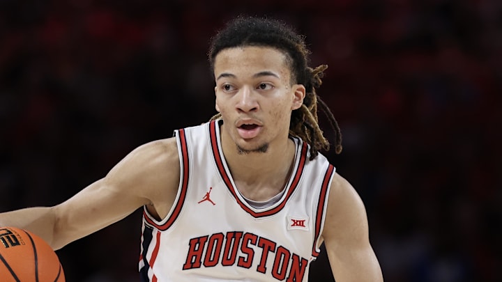 Mar 4, 2026; Houston, Texas, USA;   Houston Cougars guard Kingston Flemings (4) dribbles against Baylor Bears in the first half at Fertitta Center. Mandatory Credit: Thomas Shea-Imagn Images