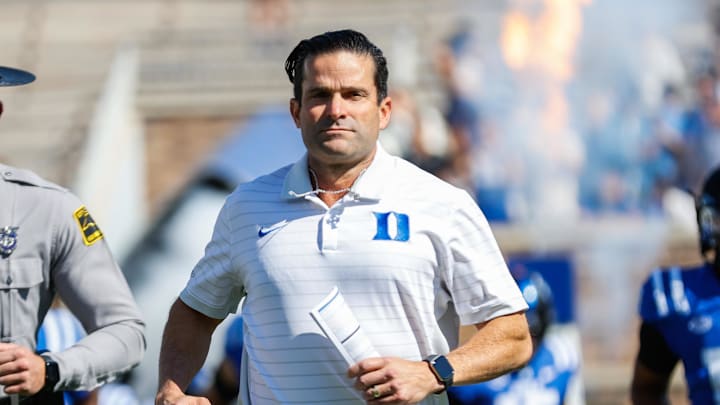 Oct 18, 2025; Durham, North Carolina, USA; Duke Blue Devils head coach Manny Diaz runs out before the first half of the game against Georgia Tech Yellow Jackets at Wallace Wade Stadium. Mandatory Credit: Jaylynn Nash-Imagn Images Oct 18, 2025; Durham, North Carolina, USA; Duke Blue Devils head coach Manny Diaz runs out before the first half of the game against Georgia Tech Yellow Jackets at Wallace Wade Stadium. Mandatory Credit: Jaylynn Nash-Imagn Images