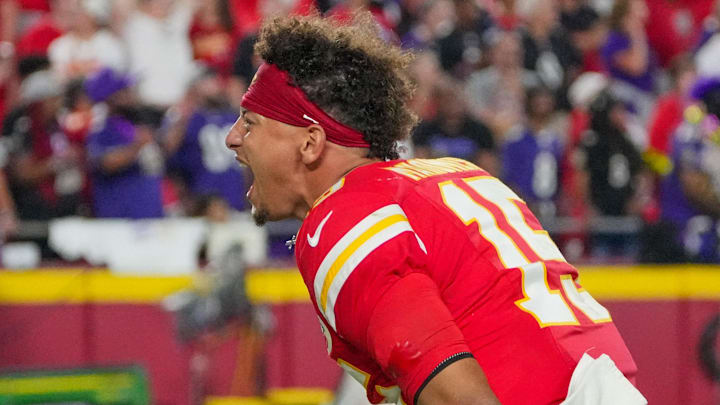 Sep 5, 2024; Kansas City, Missouri, USA; Kansas City Chiefs quarterback Patrick Mahomes (15) celebrates on field after the win over the Baltimore Ravens at GEHA Field at Arrowhead Stadium. Mandatory Credit: Denny Medley-Imagn Images