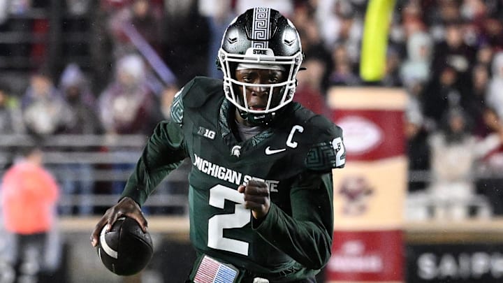 Sep 21, 2024; Chestnut Hill, Massachusetts, USA; Michigan State Spartans quarterback Aidan Chiles (2) runs the ball against the Boston College Eagles during the first half at Alumni Stadium. Mandatory Credit: Eric Canha-Imagn Images