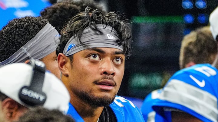 Detroit Lions running back Sione Vaki looks at the big screen during the first quarter of a preseason game at Ford Field