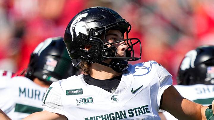 Oct 3, 2026; Madison, Wisconsin, USA;  Michigan State Spartans quarterback Alessio Milivojevic (11) throws a pass during the first quarter against the Wisconsin Badgers at Camp Randall Stadium. Mandatory Credit: Jeff Hanisch-Imagn Images
