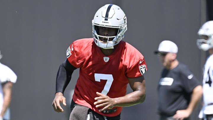 Jun 10, 2025; Henderson, NV, USA; Las Vegas Raiders quarterback Geno Smith (7) runs during a drill during Las Vegas Raiders Minicamp at Intermountain Health Performance Center.