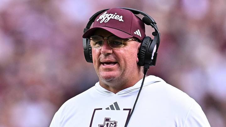 Texas A&M Aggies head coach Mike Elko walks onto the field during a time-out in the first quarter against the Missouri State Bears at Kyle Field. Texas A&M Aggies head coach Mike Elko walks onto the field during a time-out in the first quarter against the Missouri State Bears at Kyle Field.