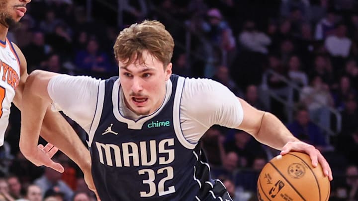 Dallas Mavericks forward Cooper Flagg drives against New York Knicks guard Josh Hart.