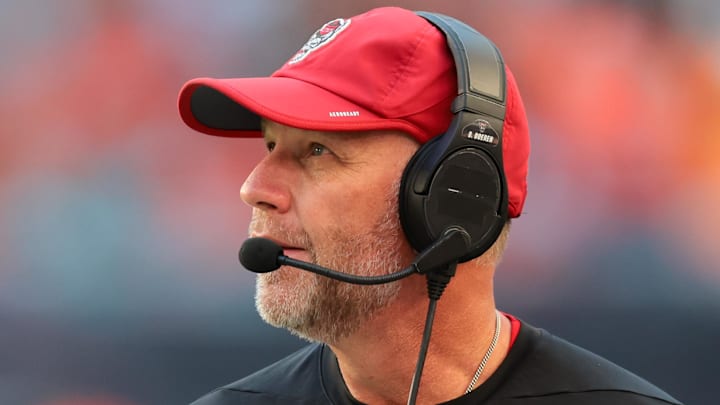 Nov 15, 2025; Miami Gardens, Florida, USA; NC State Wolfpack head coach Dave Doeren watches from the sideline against the Miami Hurricanes during the second quarter at Hard Rock Stadium. Mandatory Credit: Sam Navarro-Imagn Images