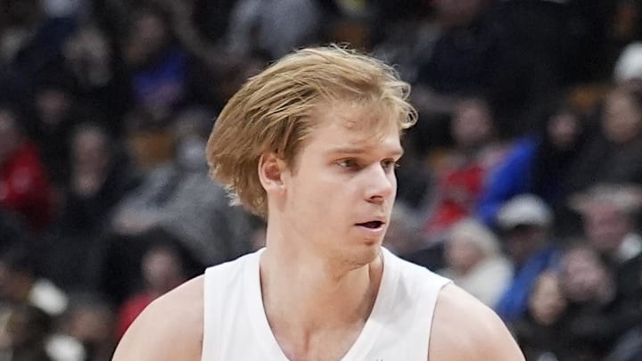 Toronto Raptors guard Gradey Dick controls the ball against the Detroit Pistons.