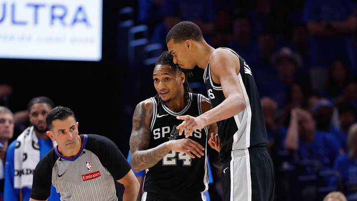 May 18, 2026; Oklahoma City, Oklahoma, USA; San Antonio Spurs guard Devin Vassell (24) and center Victor Wembanyama (1) exchange words in the third quarter against the Oklahoma City Thunder during game one of the western conference finals for the 2026 NBA playoffs at Paycom Center. Mandatory Credit: Alonzo Adams-Imagn Images May 18, 2026; Oklahoma City, Oklahoma, USA; San Antonio Spurs guard Devin Vassell (24) and center Victor Wembanyama (1) exchange words in the third quarter against the Oklahoma City Thunder during game one of the western conference finals for the 2026 NBA playoffs at Paycom Center. Mandatory Credit: Alonzo Adams-Imagn Images