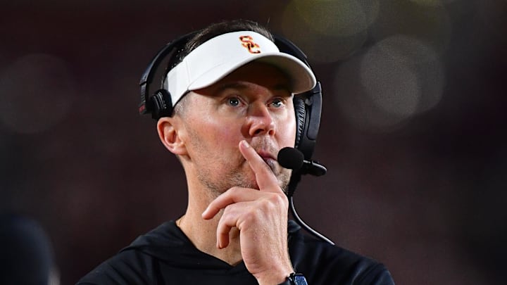 Nov 7, 2025; Los Angeles, California, USA; Southern California Trojans head coach Lincoln Riley watches game action against the Northwestern Wildcats during the second half at the Los Angeles Memorial Coliseum. Mandatory Credit: Gary A. Vasquez-Imagn Images Nov 7, 2025; Los Angeles, California, USA; Southern California Trojans head coach Lincoln Riley watches game action against the Northwestern Wildcats during the second half at the Los Angeles Memorial Coliseum. Mandatory Credit: Gary A. Vasquez-Imagn Images