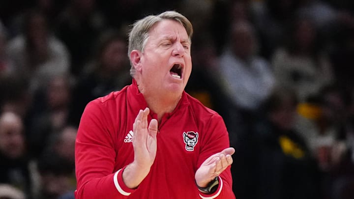 Apr 5, 2024; Cleveland, OH, USA; NC State Wolfpack head coach Wes Moore reacts in the second quarter against the South Carolina Gamecocks in the semifinals of the Final Four of the women's 2024 NCAA Tournament at Rocket Mortgage FieldHouse. Mandatory Credit: Kirby Lee-Imagn Images
