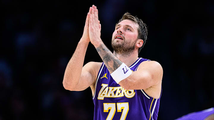 Mar 27, 2026; Los Angeles, California, USA; Los Angeles Lakers guard Luka Doncic (77) gestures during the second half against the Brooklyn Nets at Crypto.com Arena. Mandatory Credit: William Liang-Imagn Images