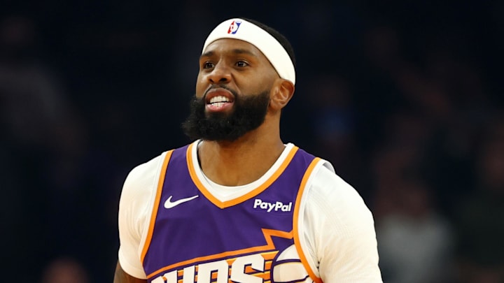 Jan 27, 2026; Phoenix, Arizona, USA; Phoenix Suns forward Royce O'Neale (00) against the Brooklyn Nets at Mortgage Matchup Center. Mandatory Credit: Mark J. Rebilas-Imagn Images