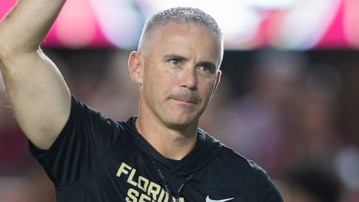 Florida State Seminoles head coach Mike Norvell walks down the field. The Miami Hurricanes lead the Florida State Seminoles 14-3 at the half on Saturday, Oct. 4, 2025.