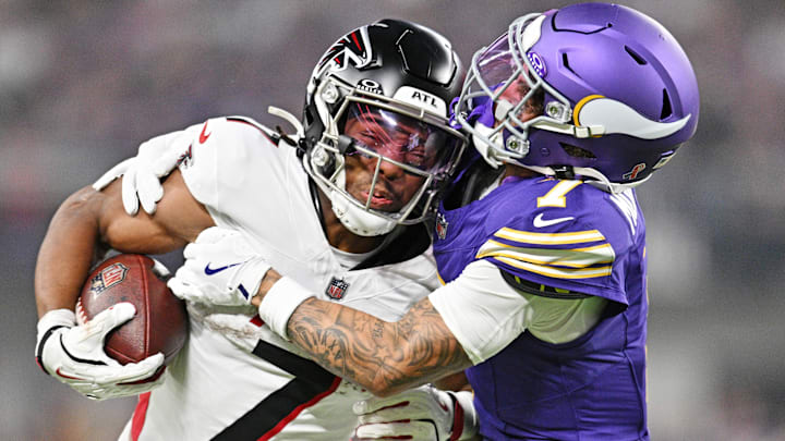 Atlanta Falcons RB Bijan Robinson (L) and Minnesota Vikings CB Byron Murphy Jr. (R)