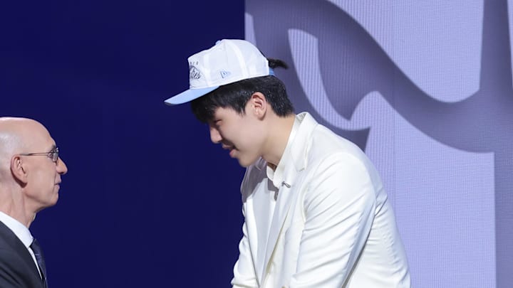 Jun 25, 2025; Brooklyn, NY, USA;  Yang Hansen greets NBA commissioner Adam Silver after being selected as the 16th pick by the Memphis Grizzlies in the first round of the 2025 NBA Draft at Barclays Center. Mandatory Credit: Brad Penner-Imagn Images