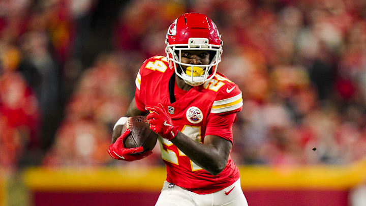 Oct 27, 2025; Kansas City, Missouri, USA; Kansas City Chiefs running back Brashard Smith (24) runs the ball during the first half against the Washington Commanders at GEHA Field at Arrowhead Stadium. Mandatory Credit: Jay Biggerstaff-Imagn Images