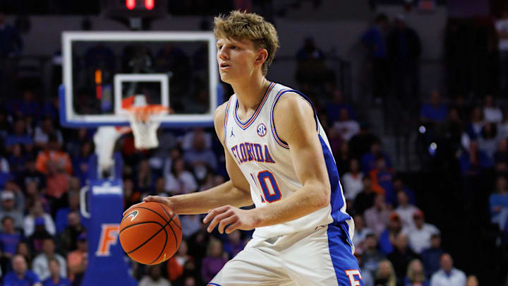 Jan 25, 2025; Gainesville, Florida, USA; Florida Gators forward Thomas Haugh (10) dribbles the ball against the Georgia Bulldogs during the second half at Exactech Arena at the Stephen C. O'Connell Center. Mandatory Credit: Matt Pendleton-Imagn Images Jan 25, 2025; Gainesville, Florida, USA; Florida Gators forward Thomas Haugh (10) dribbles the ball against the Georgia Bulldogs during the second half at Exactech Arena at the Stephen C. O'Connell Center. Mandatory Credit: Matt Pendleton-Imagn Images