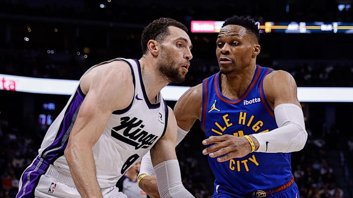 Mar 5, 2025; Denver, Colorado, USA; Sacramento Kings guard Zach LaVine (8) controls the ball under pressure from Denver Nuggets guard Russell Westbrook (4) in the fourth quarter at Ball Arena. Mandatory Credit: Isaiah J. Downing-Imagn Images Mar 5, 2025; Denver, Colorado, USA; Sacramento Kings guard Zach LaVine (8) controls the ball under pressure from Denver Nuggets guard Russell Westbrook (4) in the fourth quarter at Ball Arena. Mandatory Credit: Isaiah J. Downing-Imagn Images