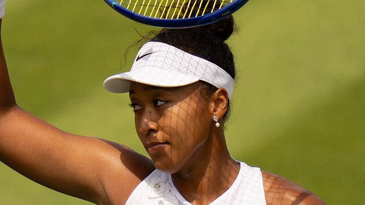 Naomi Osaka reacts to a point at Wimbledon